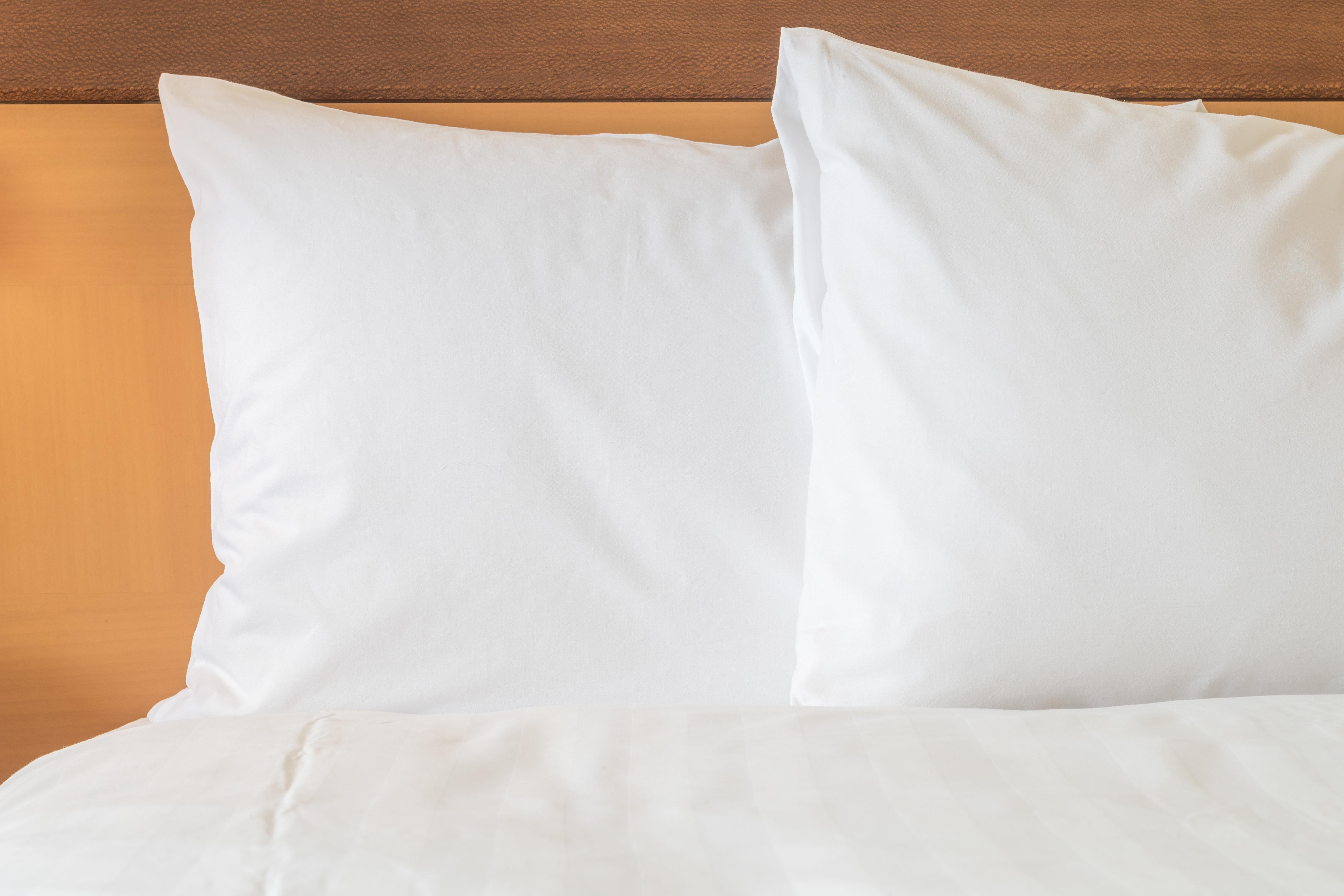 Belair Unique Mexico City Wtc, Trademark By Wyndham Luaran gambar Two pillows on a bed